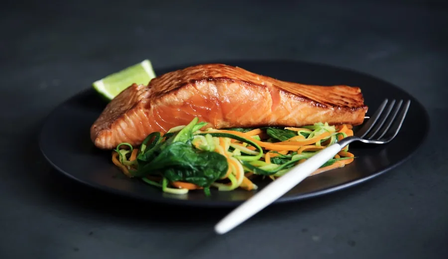 Pan-seared wild salmon served with roasted baby potatoes and steamed green beans