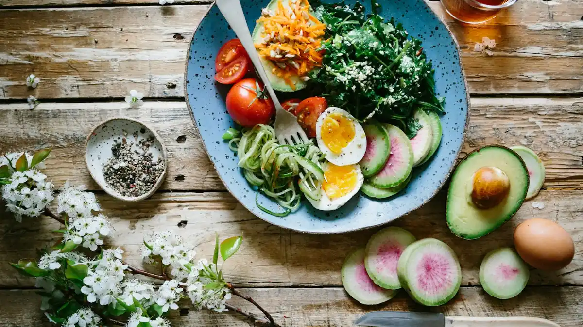 High-volume colorful nutrient-dense whole foods platter with vegetables, legumes, and lean protein